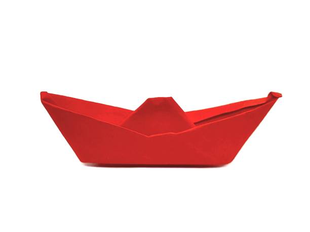 istock One red paper ship isolated with white background 2174096008