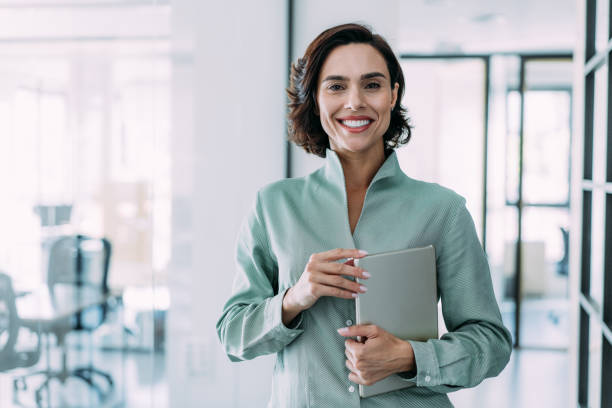 istock Confident businesswoman in modern office. 2174096112