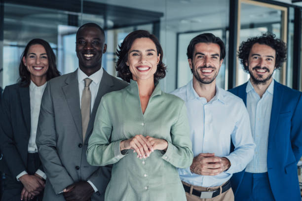 istock Confident businesswoman and her team. 2174096157
