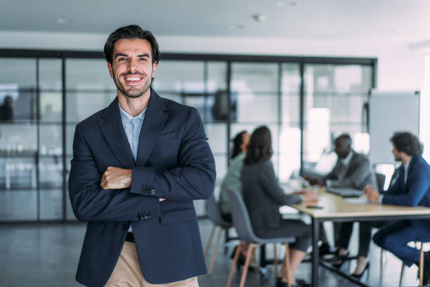 istock Confident businessman and his team. 2174096164