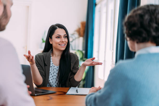 istock Group of business persons talking in the office. 2174096203