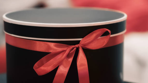 istock gift surprise box with red ribbon 2174097549