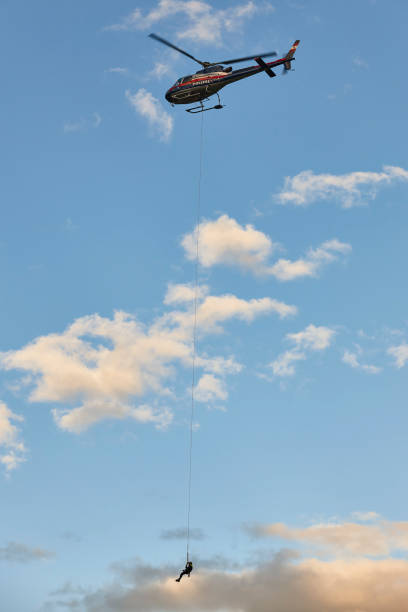 istock Helicopter rescue team training simulation. Austria police division 2174099934