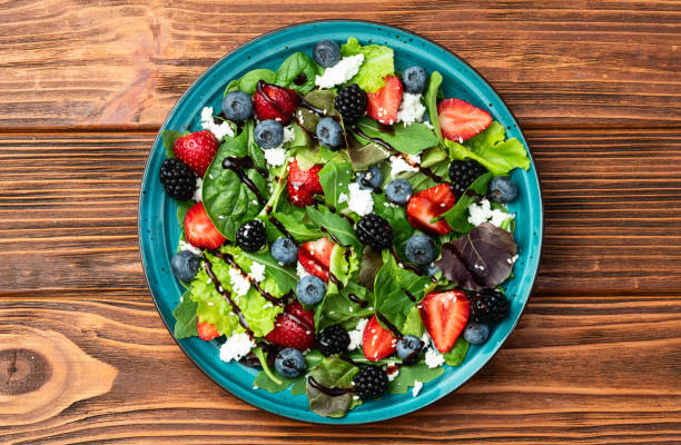istock Berries salad (blueberry strawberry blackberry ) with cheese feta and balsamic sauce 2174103248