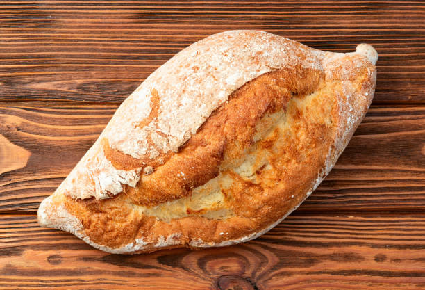 istock Loaf of  wheat hearth bread . Top view 2174103261