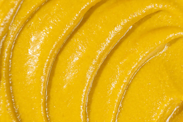 istock Macro Texture Mustard Sauce, Natural Traditional Spicy Mustard Sauce. 2174105447
