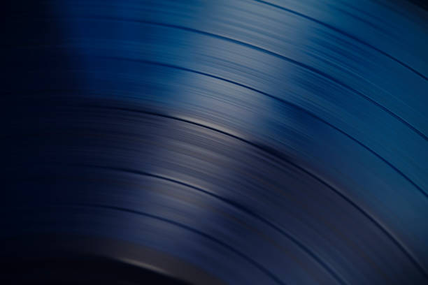 Sound tracks on a vinyl blue record closeup macro photo