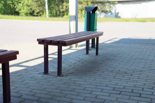 istock Bench at the bus station on the street 2174108986