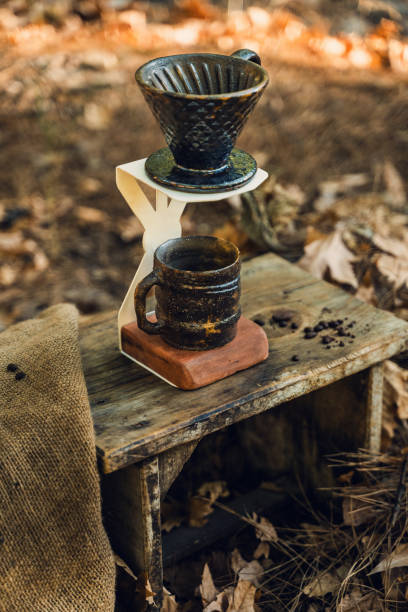 istock Artisan Ceramic Filter and Mug Setup Outdoors 2174110961