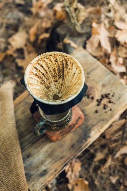 istock Top View of Ceramic Coffee Filter on Wooden Table 2174110986