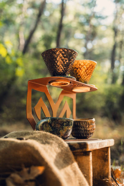 istock Double Ceramic Coffee Filter Setup with Artistic Stand in Nature 2174111094