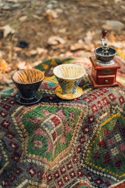 istock Ceramic Coffee Filters with Grinder on Traditional Fabric 2174111209