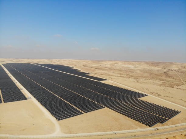 istock Solar panels power station desert aerial view 2174118899