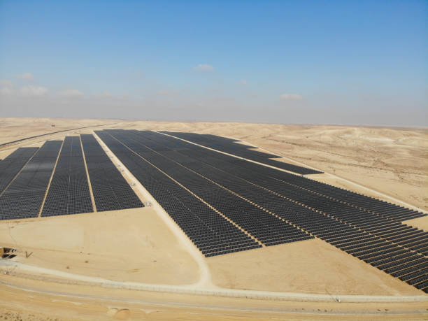 istock Solar panels power station desert aerial view 2174118978