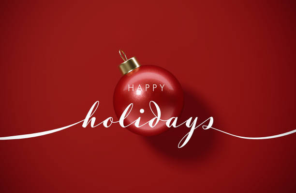 istock Happy Holidays Message And Red Bauble On Red Background - Happy Holidays Concept 2174120132