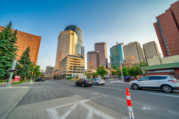 Calgary, Alberta - July 10, 2024: Cars along the Riverwalk at sunset.