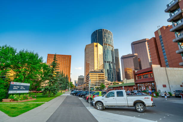 Calgary, Alberta - July 10, 2024: Cars along the Riverwalk at sunset.