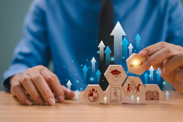 skill development concept. up new ability skill training for technology evolution. leadership thinking upskill competency. hand hold wooden cube, soft skill digital icon. education learning talent - melhoria de competências imagens e fotografias de stock