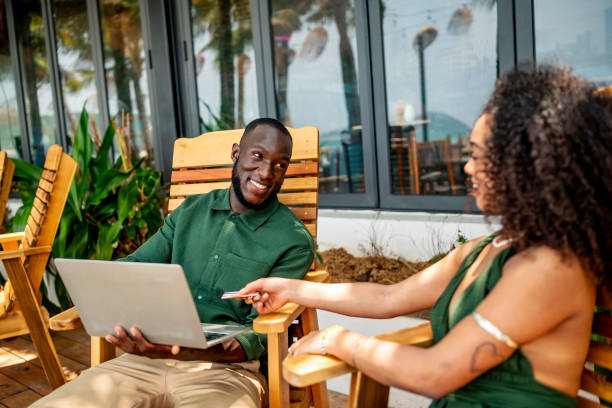 istock Colleagues Collaborating Outdoors on a Sunny Day 2174132782