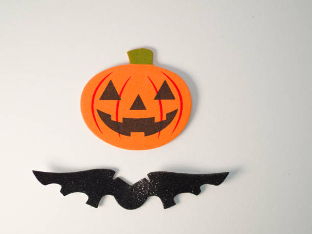 istock Orange helloween pumpkin and bat 2174133999