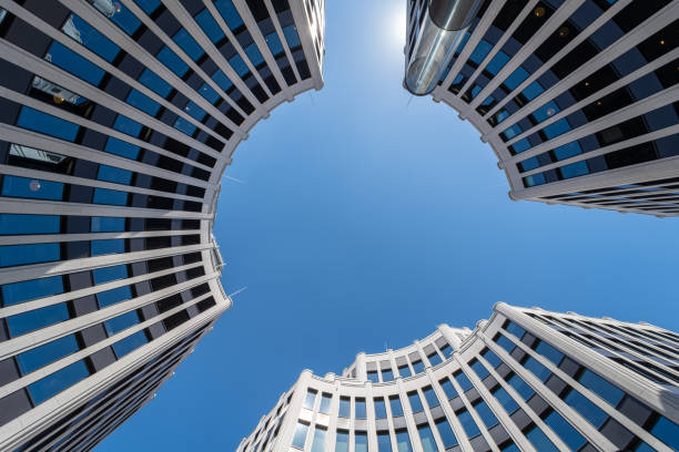 Germany, Berlin, Central Berlin, July 09, 2024 - Low angle view of modern office building against clear sky