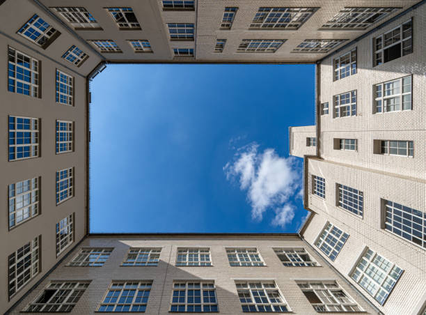 istock Low angle view of residential buildings against sky 2174136493