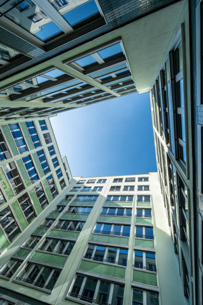 istock Low angle view of modern office buildings against clear sky 2174136506