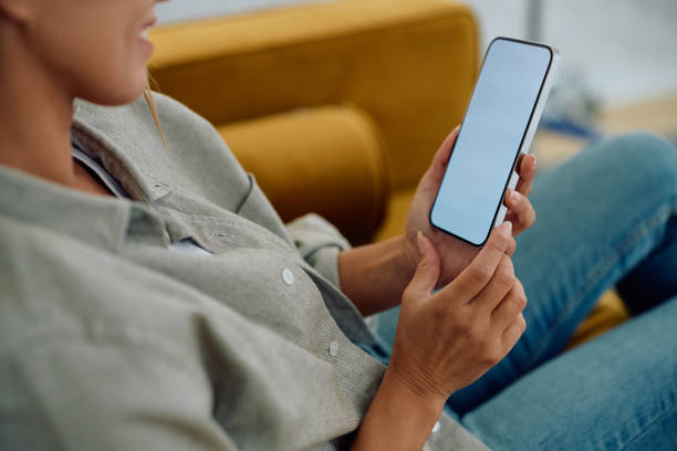 istock Close up of woman using smart phone. 2174136783