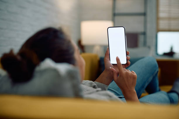 istock Close up of woman using app on cell phone. 2174136793