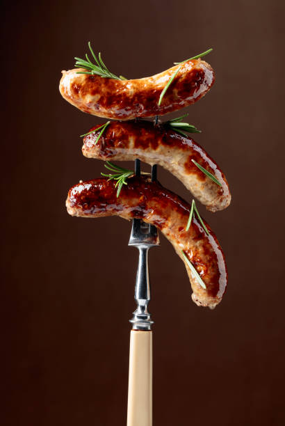 istock Grilled Bavarian sausages with rosemary. 2174138511