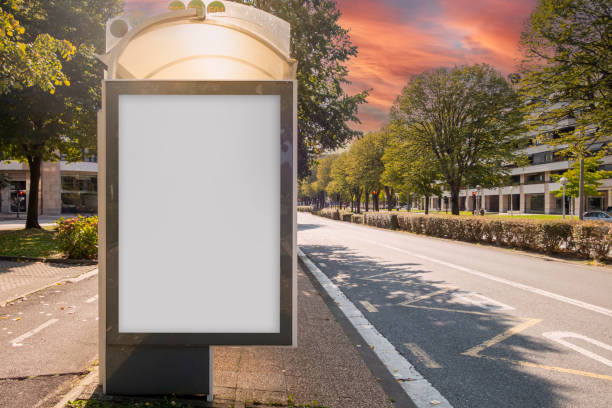istock Blank billboard mock up in a bus stop in the street 2174140616