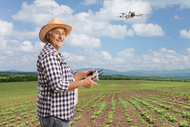 istock Farmer flying a drone on a field with plants 2174141967