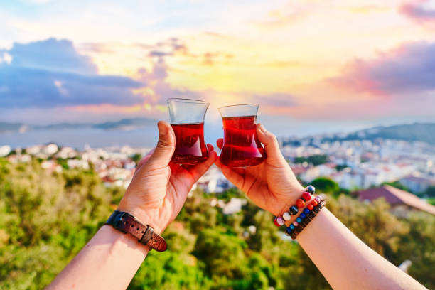 Drinking traditional Turkish tea with a beautiful view at sunny day during vacation holidays