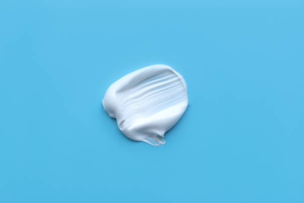 istock A smear of cream on a light background. Beauty concept. 2174145500