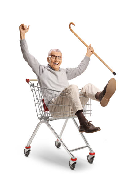 istock Happy elderly man sitting inside a shopping cart 2174146392