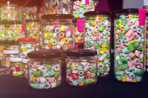 Assorted variety of colorful candy in glass container