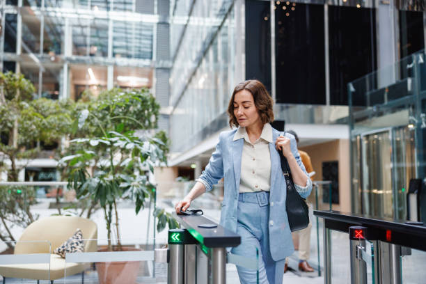 Professional Woman Enters Contemporary Office Setting