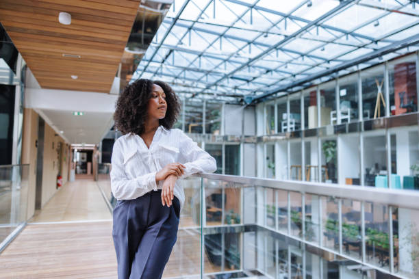 istock Professional Young Black Businesswoman in Modern Office Setting 2174150444