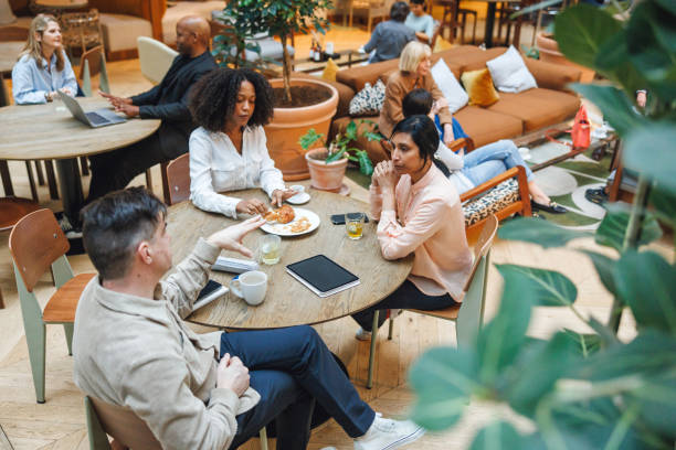 istock Diverse Team Engaging in Creative Collaboration at Office Cafe 2174150508