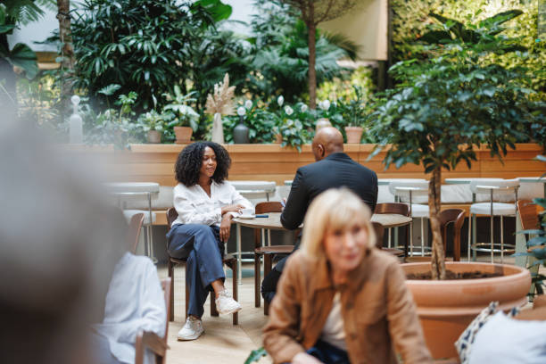 istock Diverse Team Engages in Creative Meeting at Office Cafe 2174150512