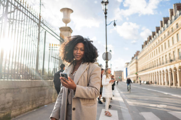 istock Confident Black Businesswoman Walking Outdoors Smiling 2174152406