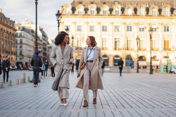 istock Cheerful Diverse Businesswomen Strolling In Town Square 2174152471