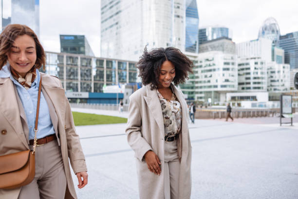 istock Young Diverse Female Business Executives Smiling Walking Downtown 2174152595