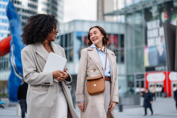 istock Office Executives Smiling Commute In City Center 2174152653