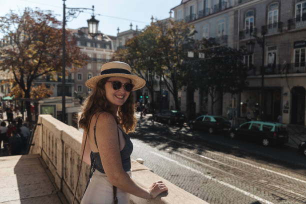 istock Smiling woman in the sun with a hat 2174152743