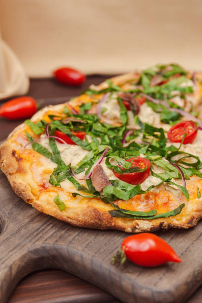 istock Rustic Italian Pizza With Anchovy And Capers 2174157788