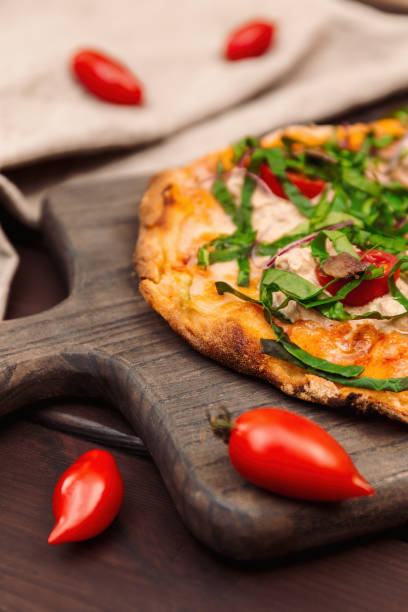istock Italian Pizza With Anchovy On Wooden Board 2174158182