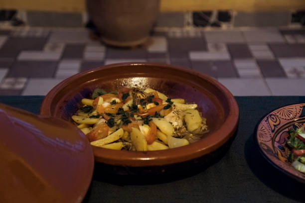 istock Traditional Moroccan Dish Featuring Pasta and Fresh Vegetables Served in a Clay Bowl 2174160142