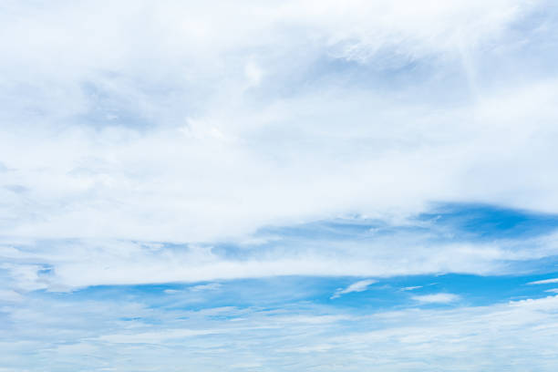 istock Beautiful blue sky with fluffy white clouds, reflecting on the calm ocean waters 2174161091