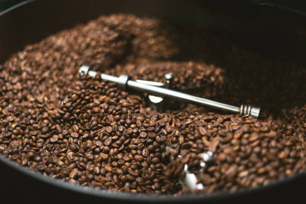 istock Fresh coffee beans in the coffee roaster. 2174163661